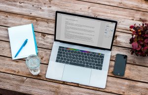 Laptop on picnic table using wireless technology - Toronto IT support services