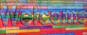 Rainbow welcome sign - FAQs for clients - Inderly IT (Toronto)